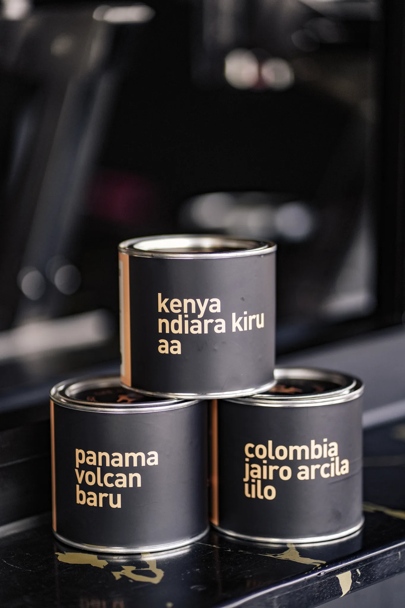 Single-origin coffee tins at The Goat Father