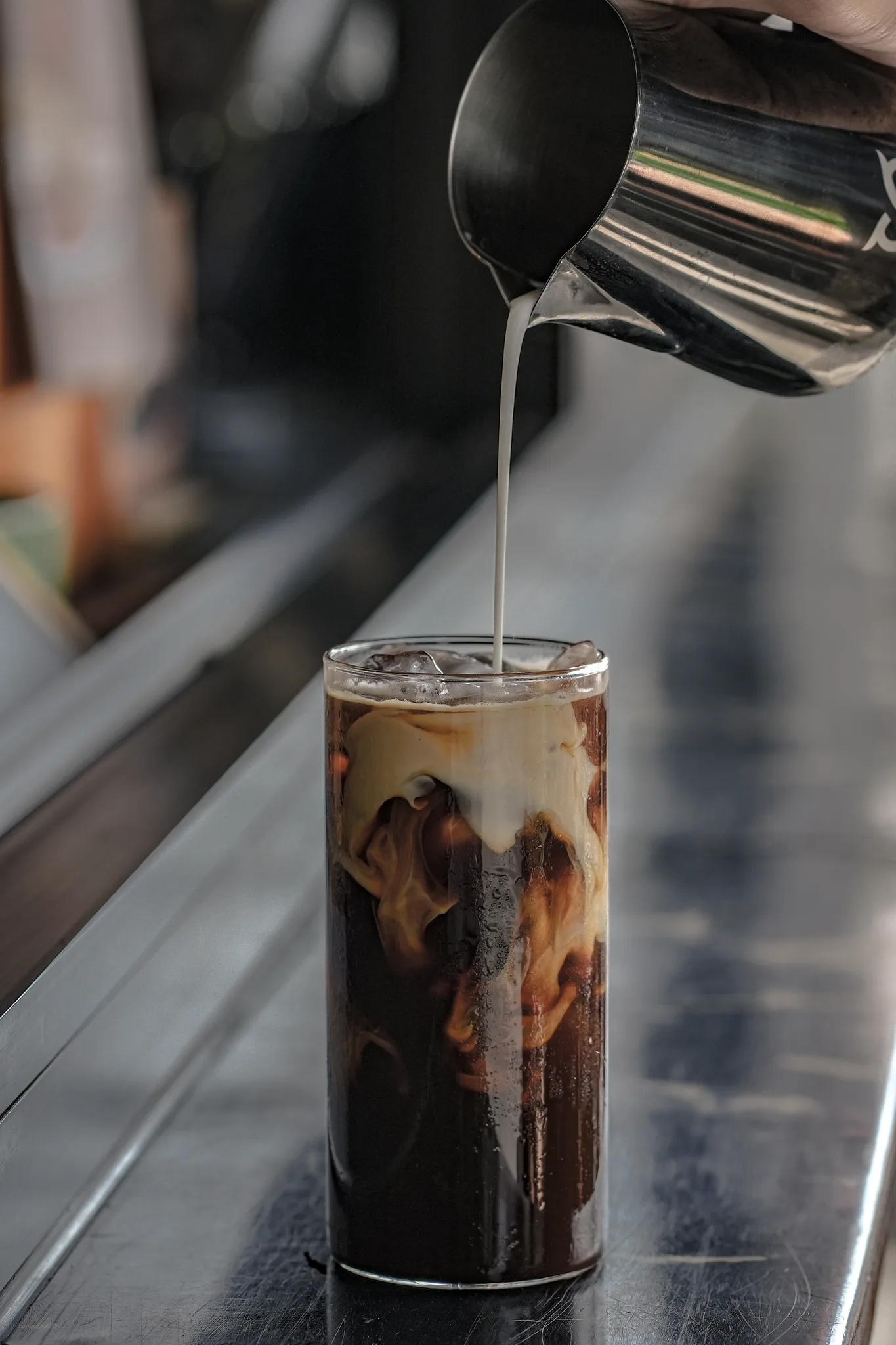 Signature iced coconut pandan latte at The Goat Father